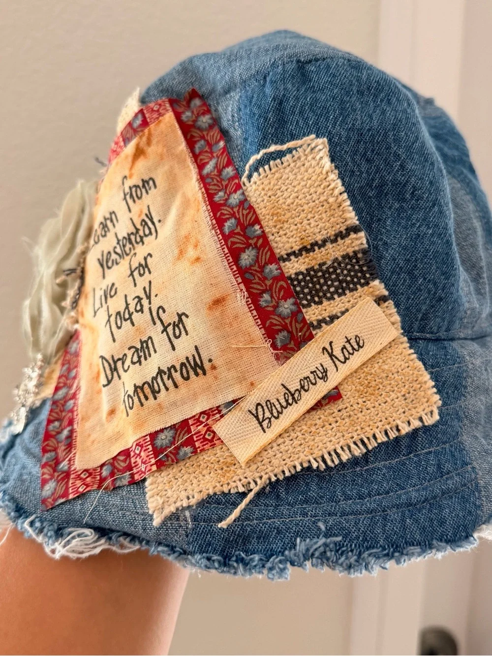 New Denim Patchwork Bucket Hat with Beige Rosette Design by Blueberry Kate